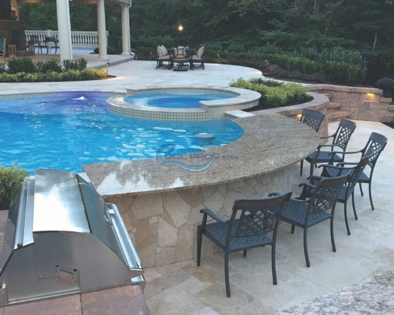 swim up bar in an inground pool with spa and grill