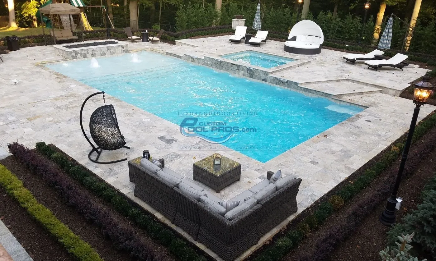 inground rectangular pool with sqare spa and travertine pool patio deck, backyard pool, inground pool