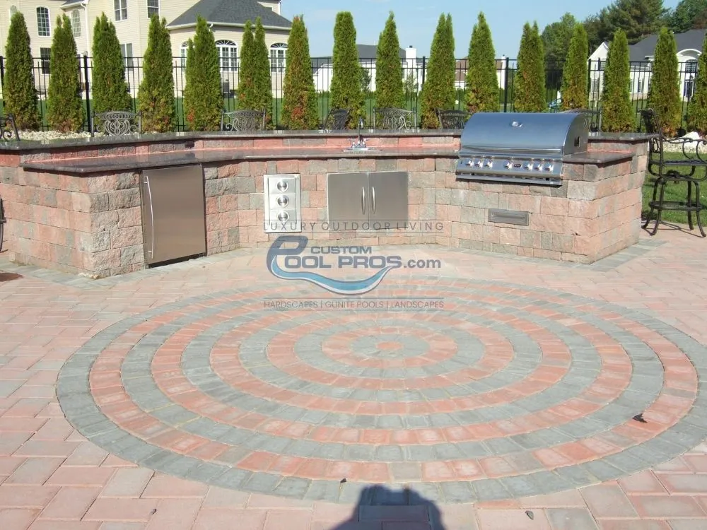 Inground pool installation. Patio with outdoor kitchen & BBQ installation in Somerset NJ