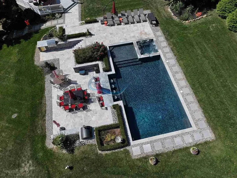gunite concrete pool installation with beautiful landscaping in NJ