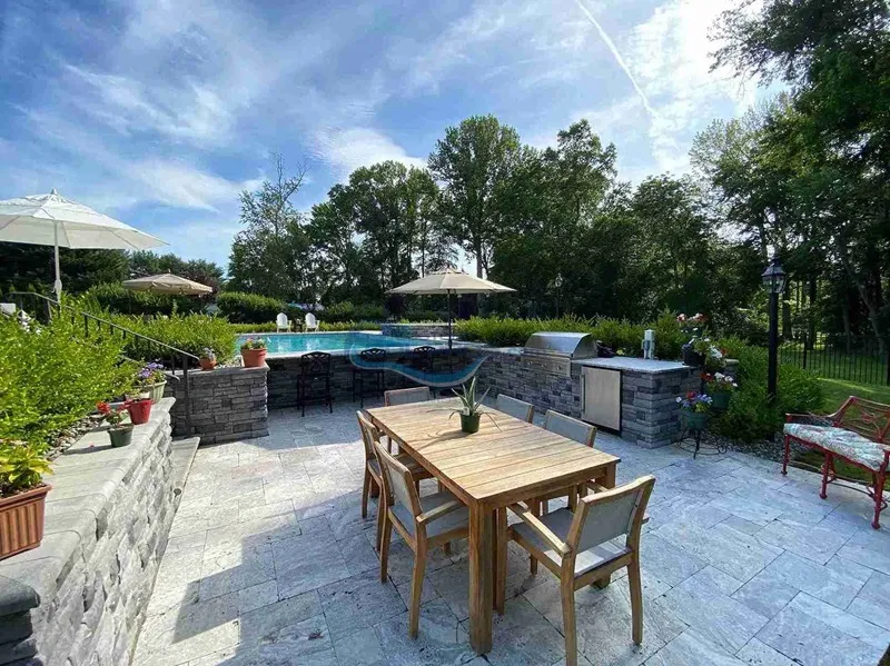 vinyl pool installation, outdoor kitchen with pool swim-up bar